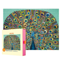 Jigsaw puzzle with peacock design and packaging on a white background