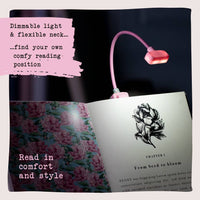 Alice in Wonderland clip-on LED book reading light by if USA with red flexible neck and illustrated packaging