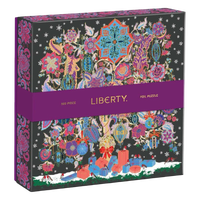 Completed Liberty London Christmas Tree of Life puzzle with colorful holiday artwork