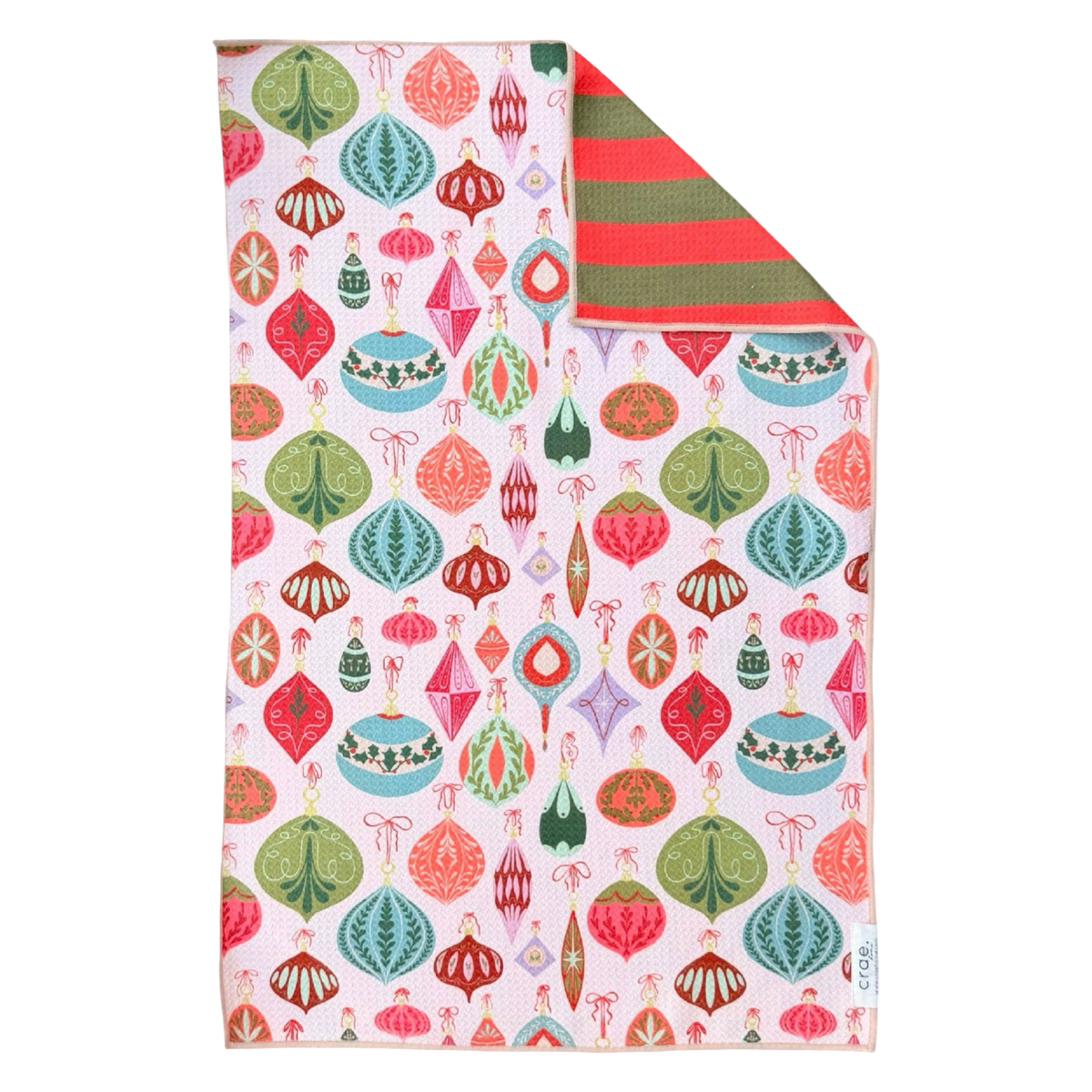 Crae.Home Decked in Detail reversible Christmas hand towel featuring colorful vintage-style ornaments in pink, red, turquoise, and green with red and green striped reverse