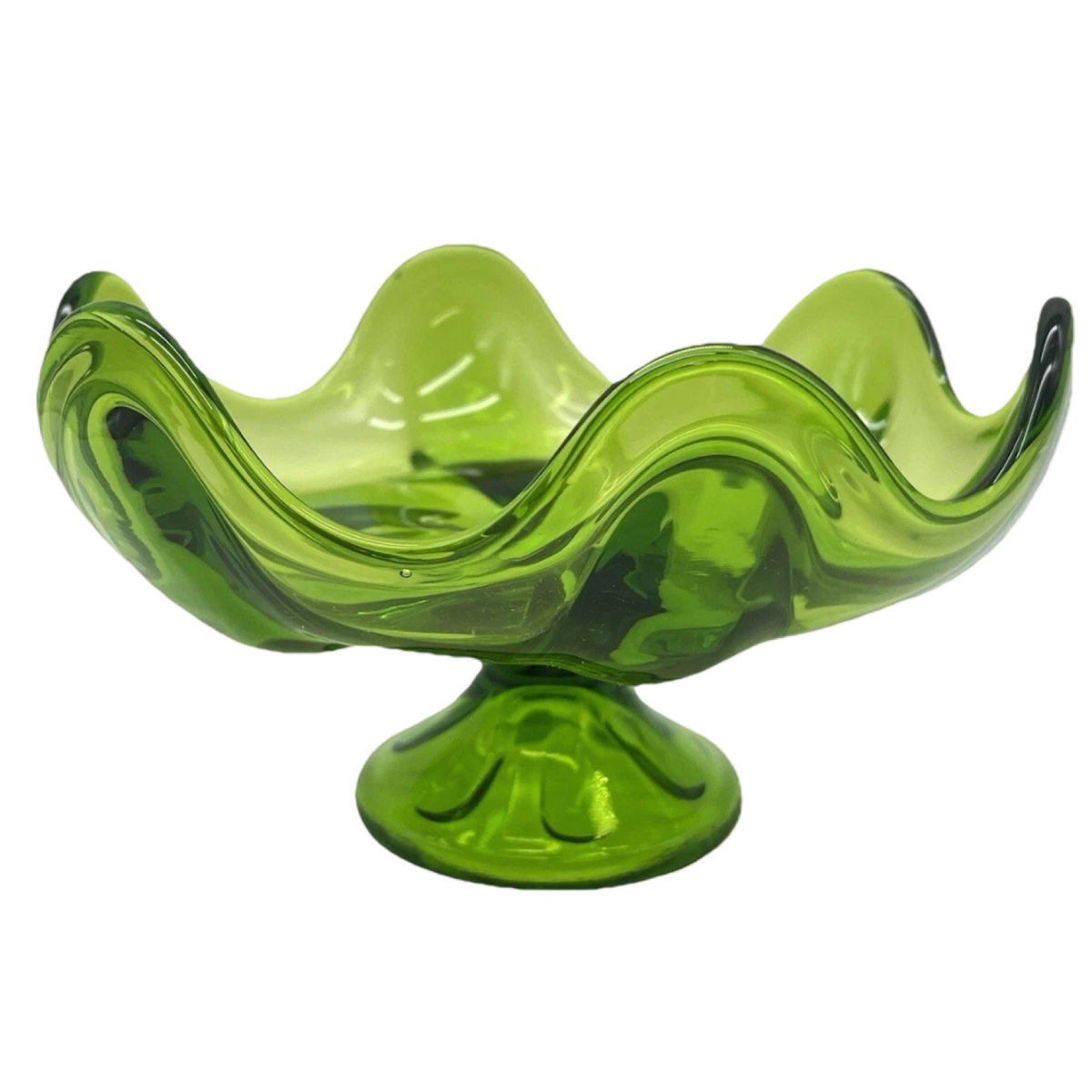 Green glass bowl with wavy design on a white background