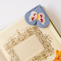 Lavender vegan leather heart corner bookmark with colorful embroidered butterfly by Good Juju Ink