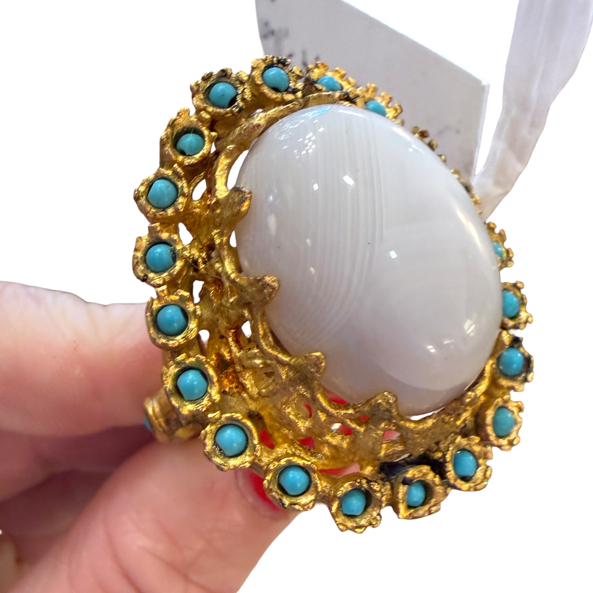Made in the Deep South 1970s vintage cocktail ring with oversized white oval cabochon and turquoise-blue accents