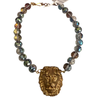 Made in the Deep South necklace with faceted multicolored glass beads and a gold-tone lion head pendant.