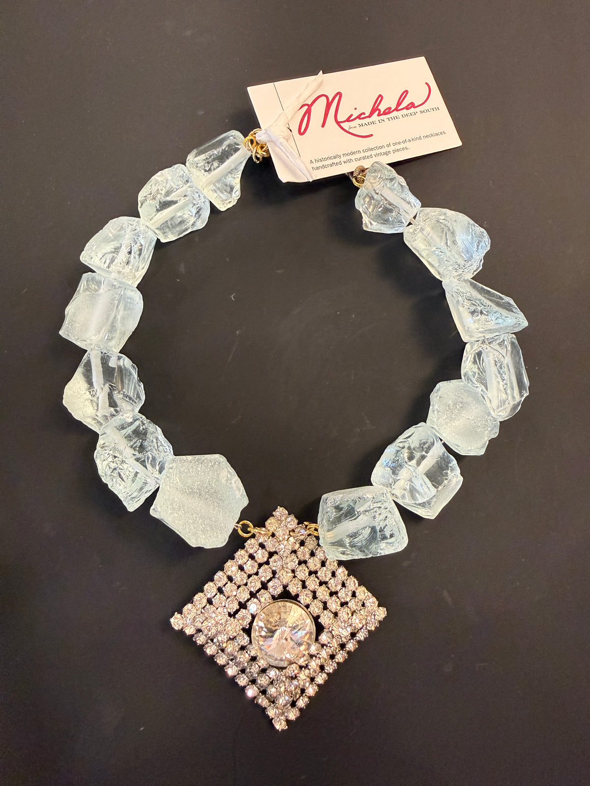 ohmeredith Made in the Deep South vintage rhinestone brooch necklace with oversized translucent aqua quartz beads worn with a blue top