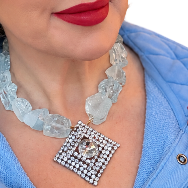 Made in the Deep South vintage rhinestone brooch necklace with oversized translucent aqua quartz beads worn with a blue top