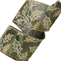 Moss green satin ribbon with glittered holly leaf outlines and wired edges, arranged in loose loops on a white background.