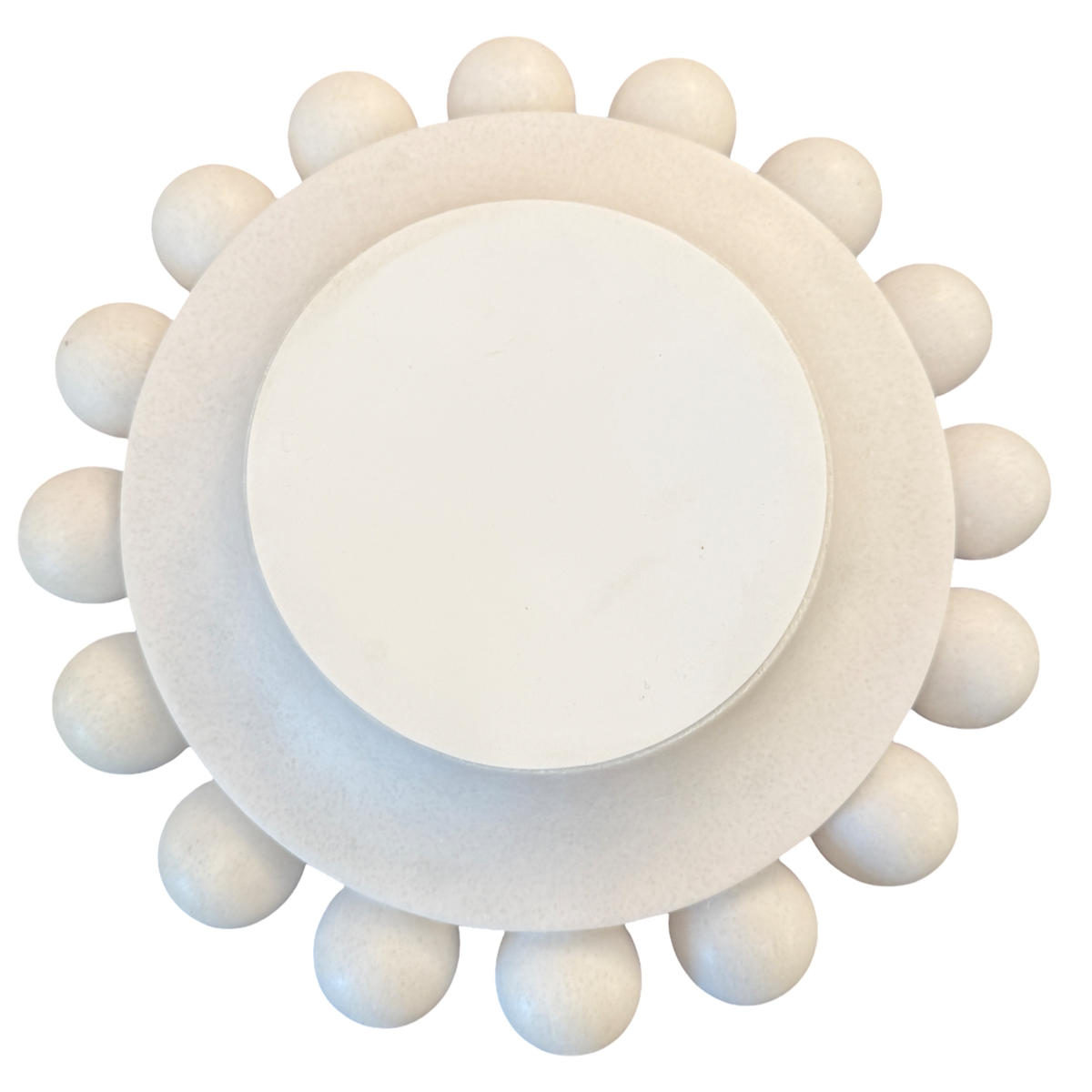 A round, off-white decorative object with a smooth central disc and a textured outer ring surrounded by small raised spheres, shown on a plain white background.