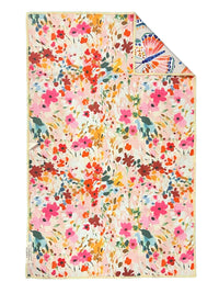 Pink and multicolored floral reverse of the Crae.Home Floatie reversible waffle-weave microfiber hand towel