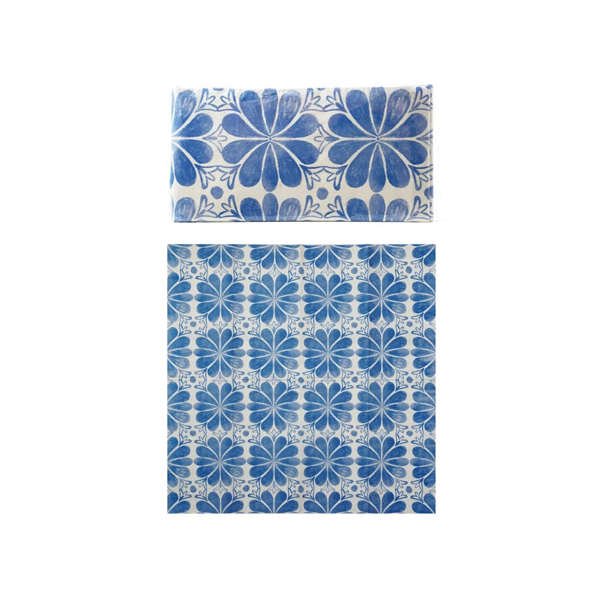 Blue floral patterned pillowcase and duvet cover set on a white background