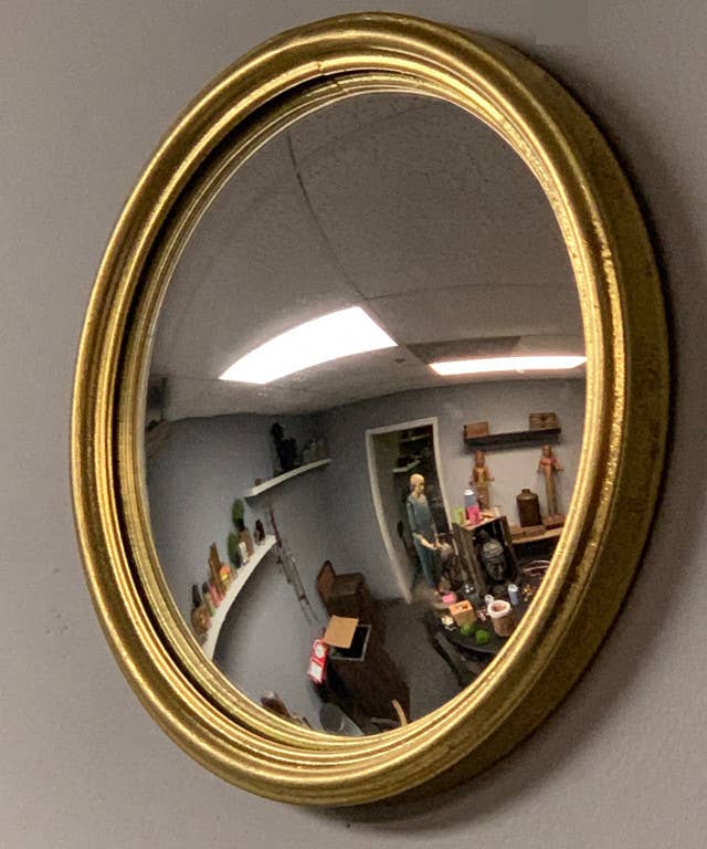 convex bullseye mirror, extra small gold wall mirror, Vagabond Vintage convex mirror, gold leaf decorative mirror, fish-eye effect mirror, round convex metal mirror, antique style wall accent, vintage inspired gold mirror, small statement mirror, stanton bullseye mirror