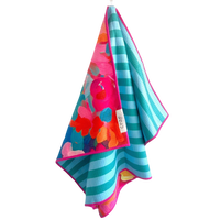 Colorful towel with floral pattern and stripes on a white background