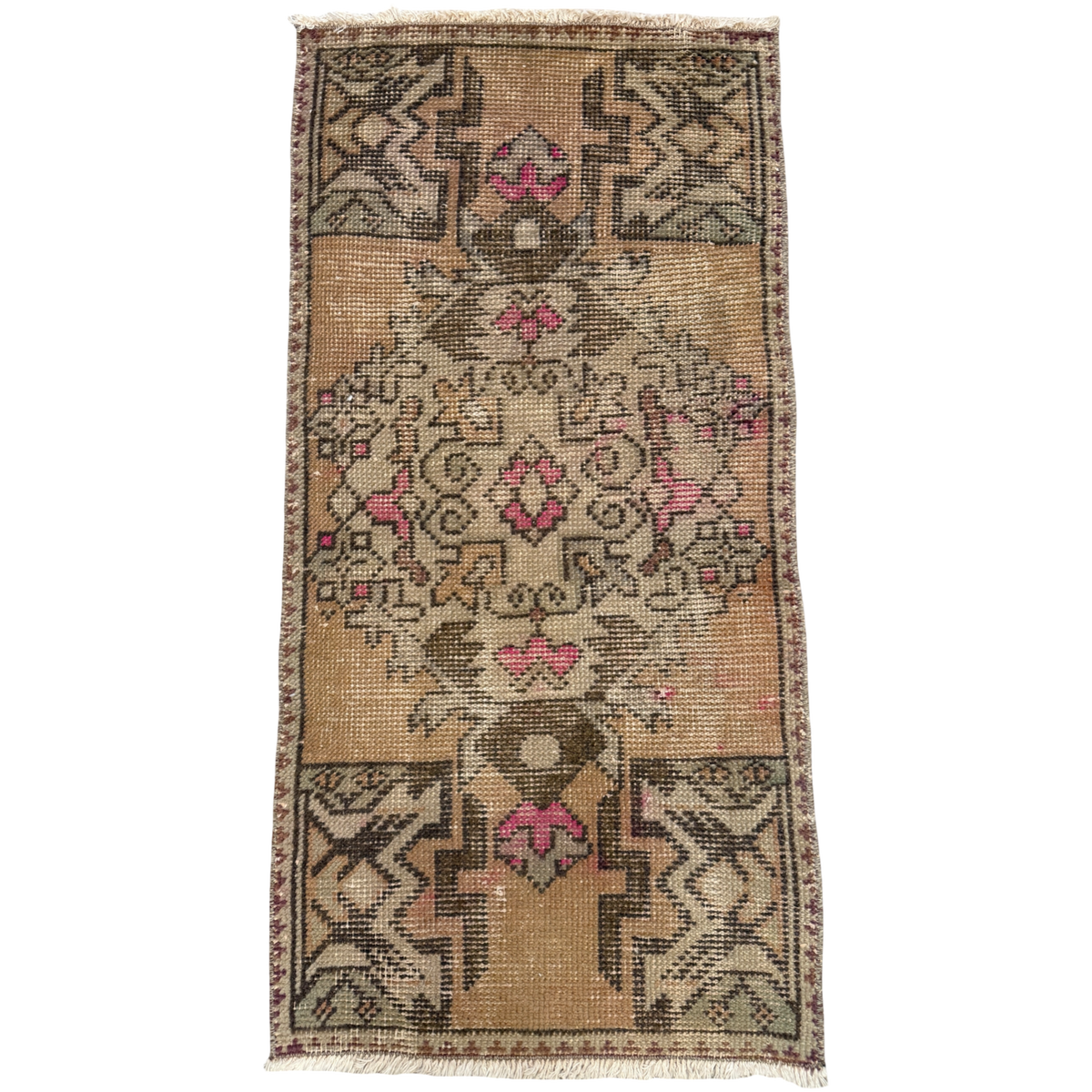 Decorative rug with intricate patterns on a plain background