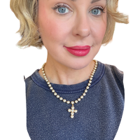 TOVA Baby Donatella necklace, a handmade pearl necklace with delicate gold detailing.
