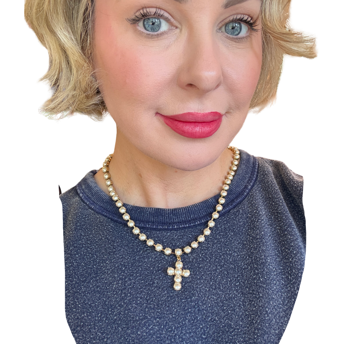 TOVA Baby Donatella necklace, a handmade pearl necklace with delicate gold detailing.