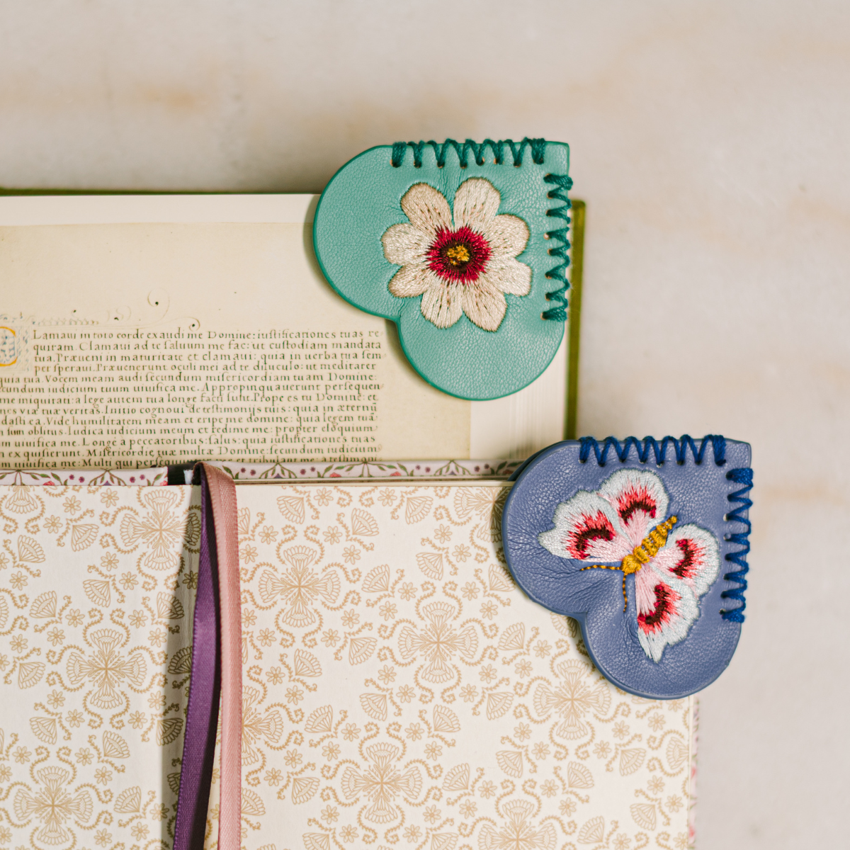 Lavender vegan leather heart corner bookmark with colorful embroidered butterfly by Good Juju Ink