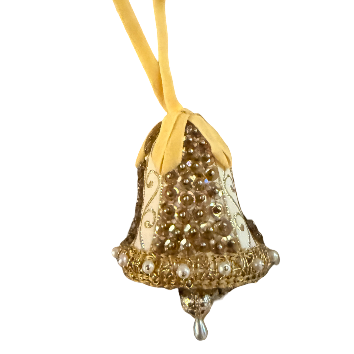 Vintage gold and ivory bell ornament with sequins, pearl-look trim, a yellow ribbon loop, and a dangling teardrop.