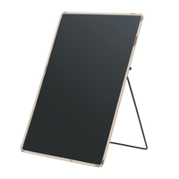 Black rectangular sign on a stand with a white background