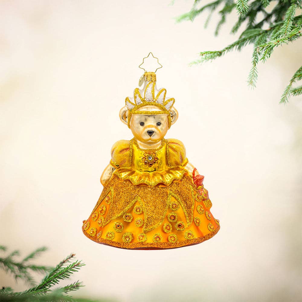 Christopher Radko A Muffy Millennium Memory glass Christmas ornament featuring a crowned Muffy bear in an elaborate golden gown.