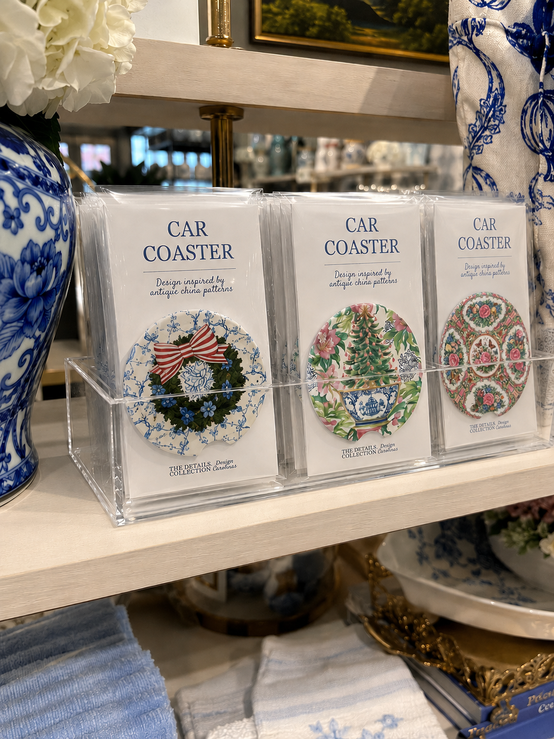 Set of two Rose Canton-inspired soapstone car coasters with pink, green and blue floral chinoiserie pattern