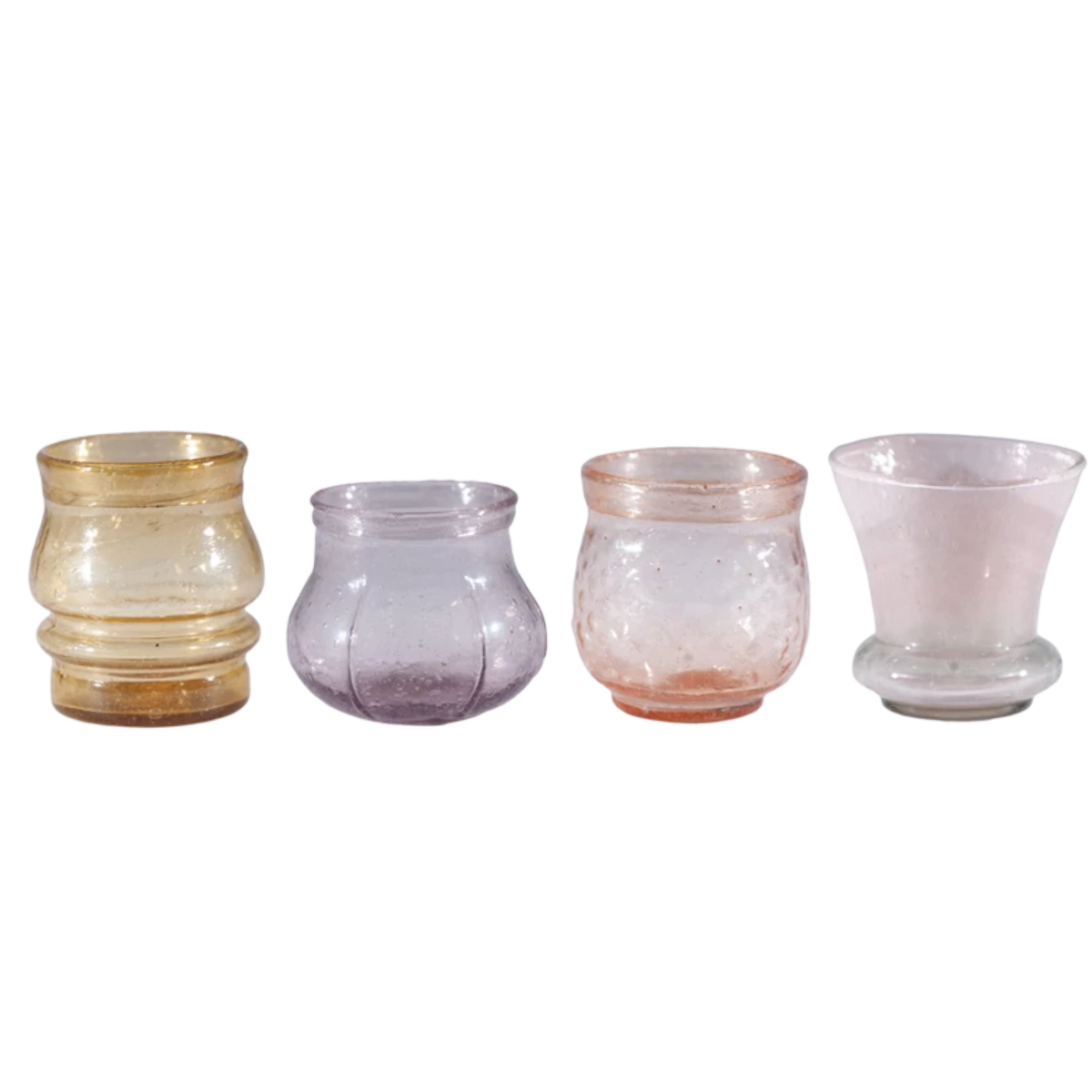 Set of four glass candle holders in different colors on a white background
